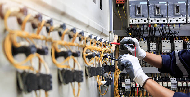Professional Electrician technician working in West Dennis, MA